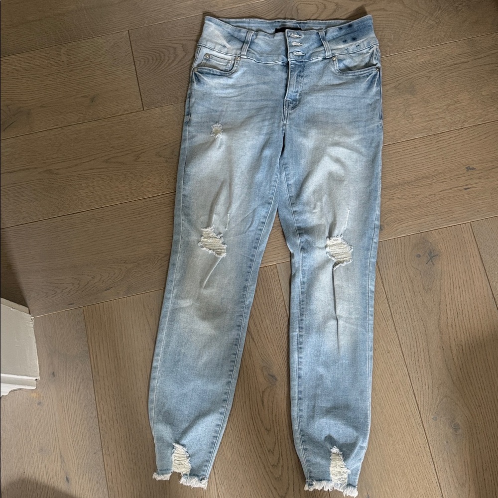 Distressed Light Blue Jeans